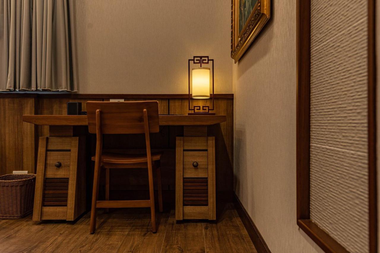 山花映水紅莊園民宿 Appartement Yuemei Buitenkant foto